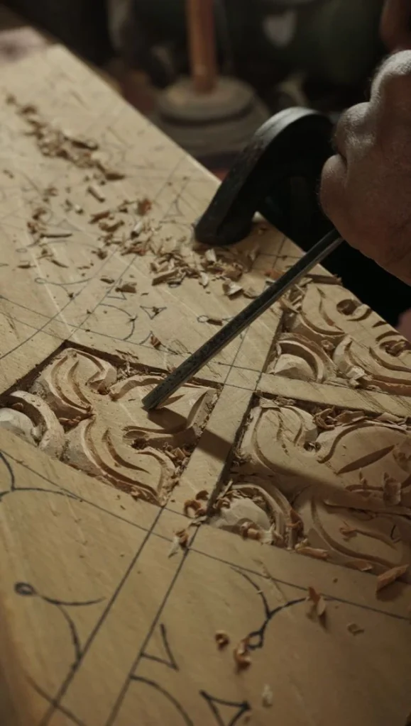 Custom Moroccan furniture handmade in Marrakech with carved wood details
